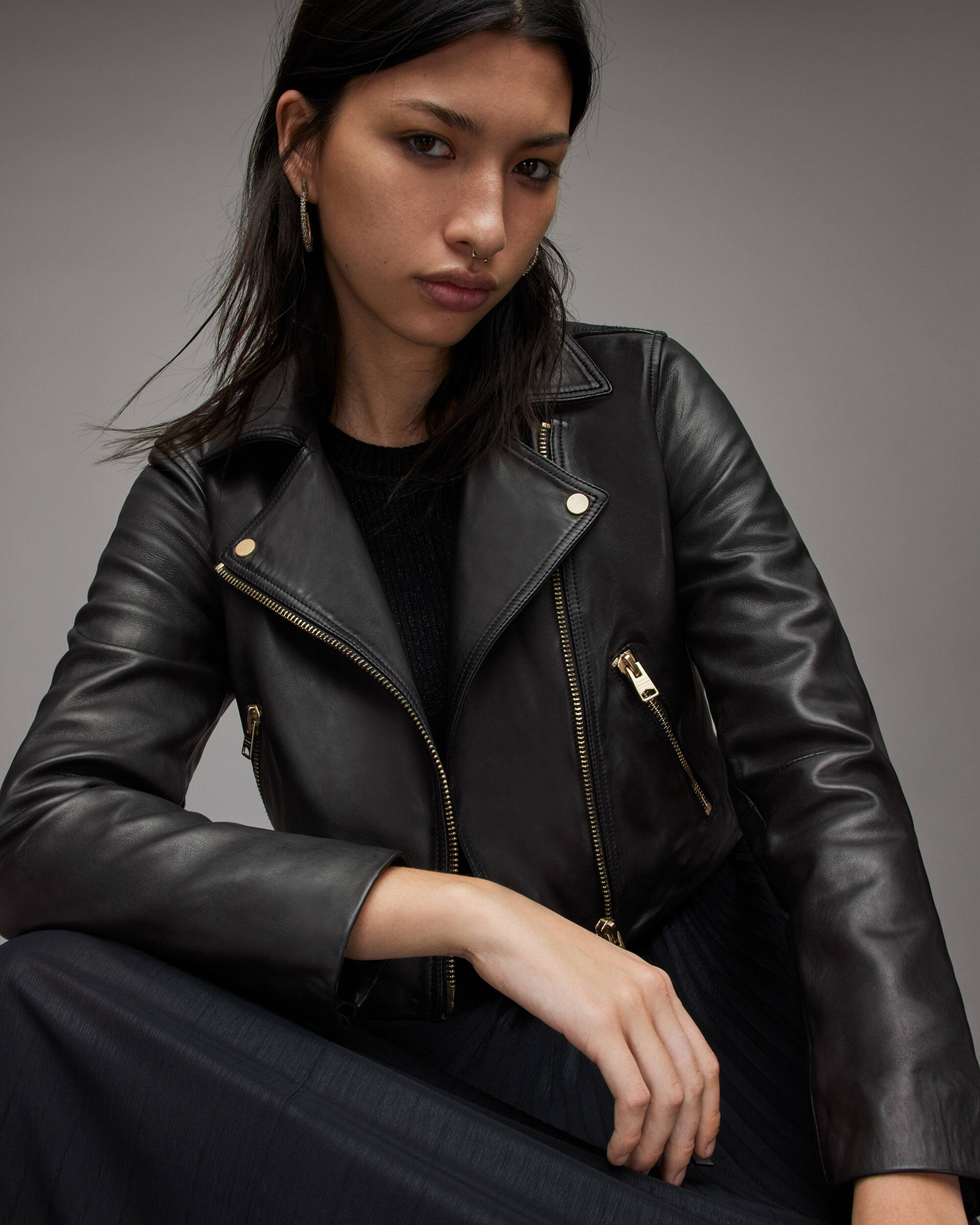 Black leather jacket with gold online zipper